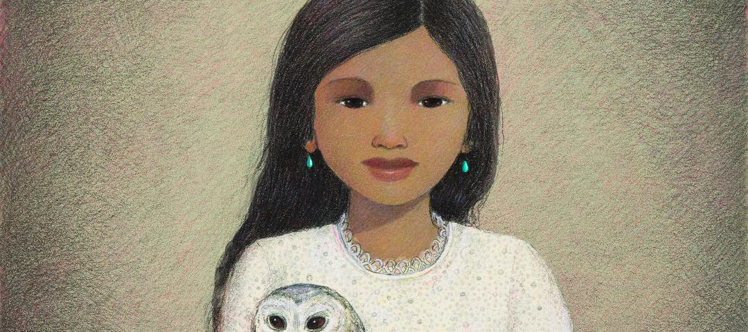 Girl holding an owl