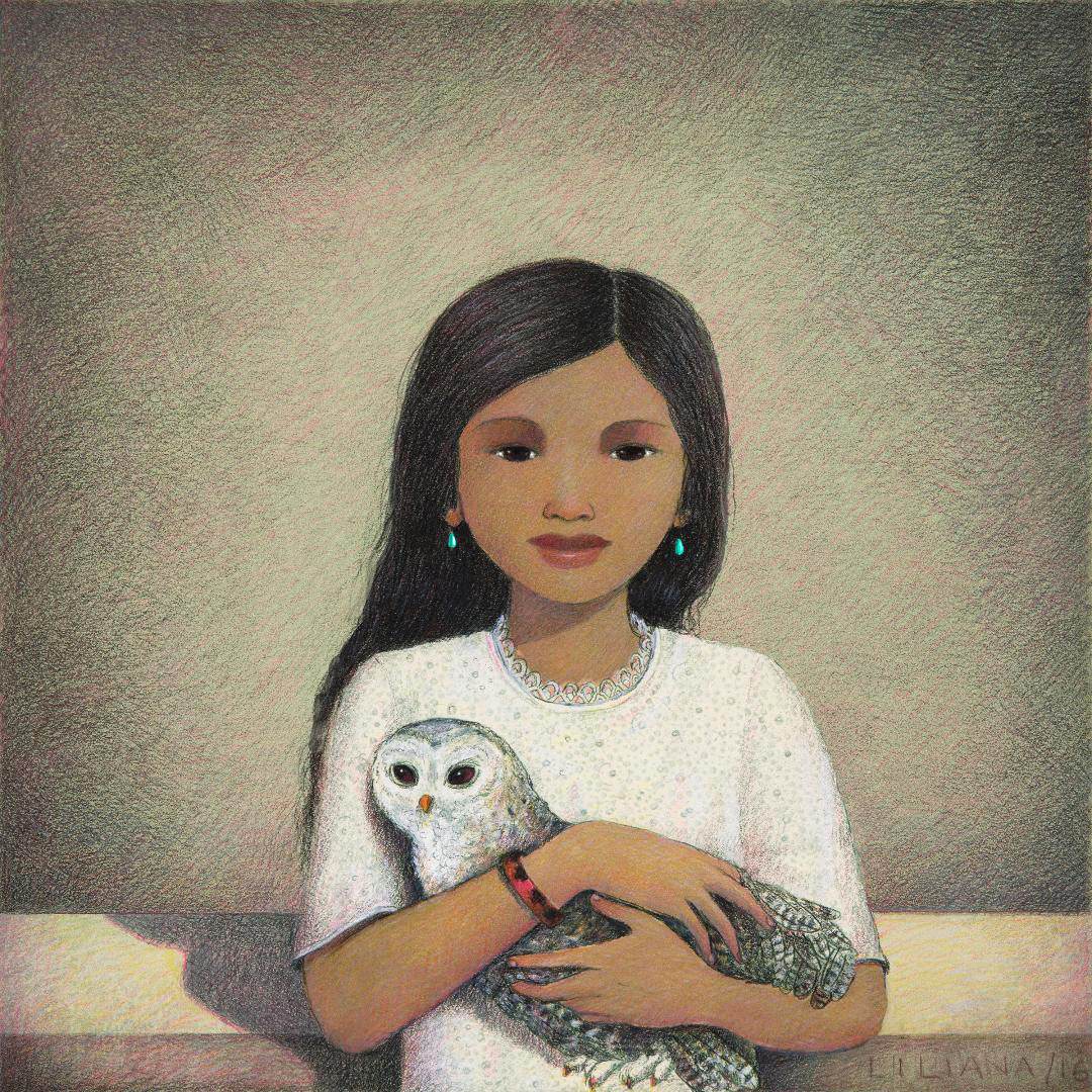 Girl holding an owl